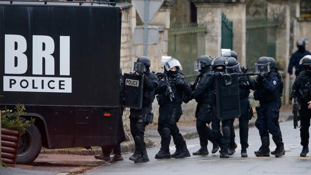 Paris police begin assault on terrorist hostage takers