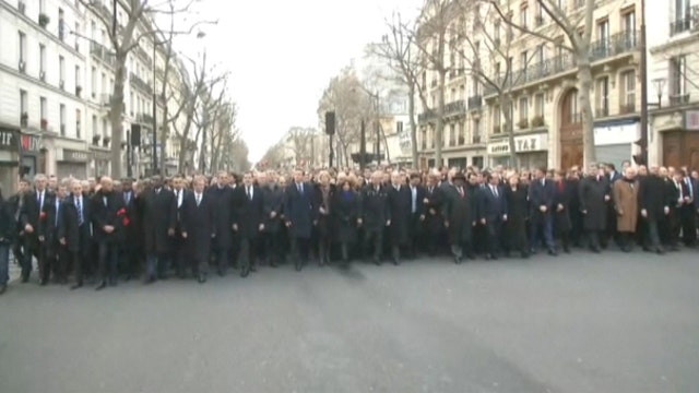 Obama sending wrong message by not attending Paris rally?