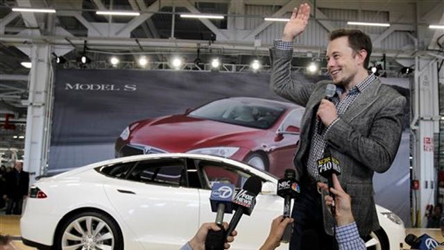 Elon Musk challenging Detroit to make electric cars