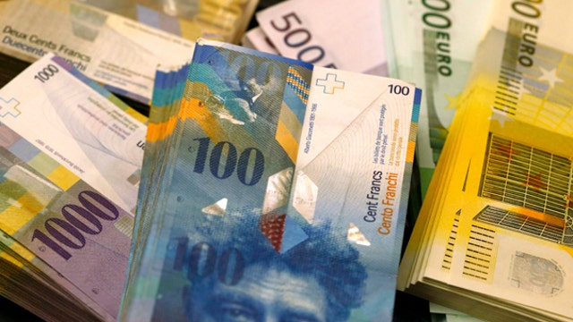 Swiss abandon currency cap