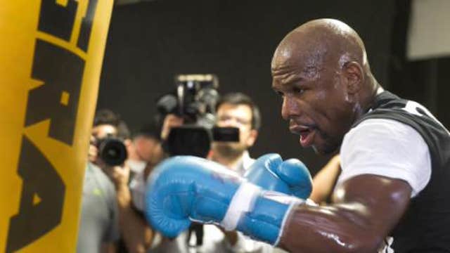 Floyd Mayweather, Manny Pacquiao agree to fight