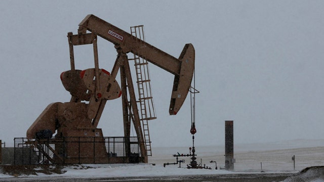 Oil settles up 3%