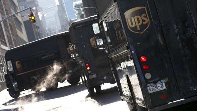 UPS shares down on rising costs
