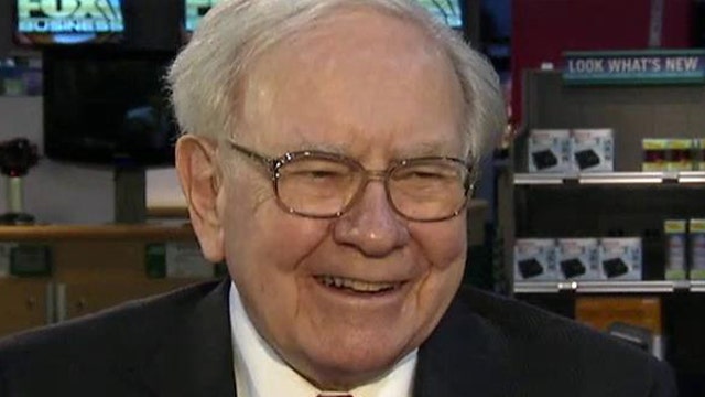 Berkshire Hathaway CEO Warren Buffett discusses his $400 million bet on housing and his views on the Fed raising rates.