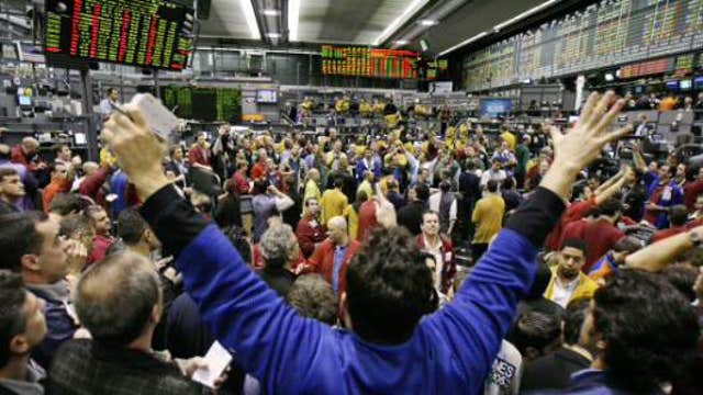 CME Group closing some futures trading pits