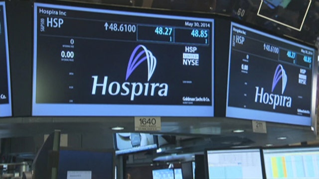 Hospira shares rise to new highs on Pfizer deal