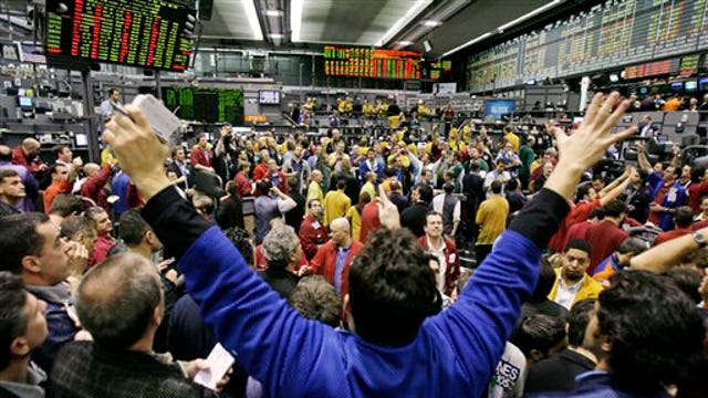 Why is CME Group closing some futures trading pits?