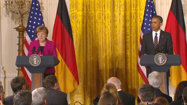 President Obama meets with German Chancellor Merkel amid global tension