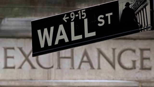 Wall Street paychecks getting smaller