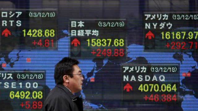 Asian shares mixed after weak China data
