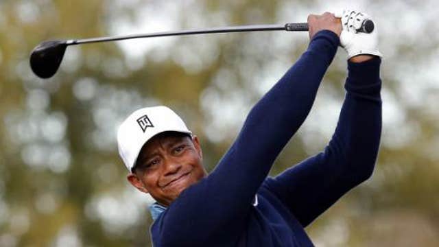 Tiger Woods takes a break from pro golf
