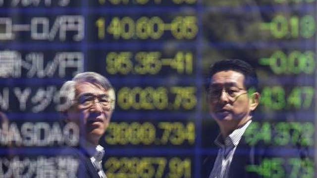 Asian shares mostly higher, Nikkei falls
