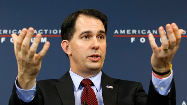 Pro-union protestors swarmed Gov. Scott Walker’s parents’ home?