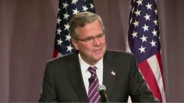 Former Gov. Jeb Bush tries to distance himself from brother, father