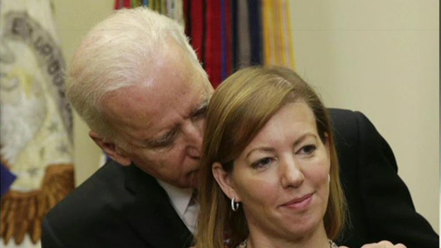 Joe Biden too touchy feely?