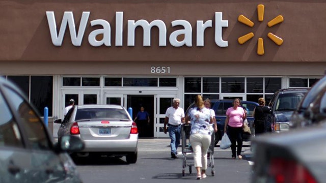 Wal-Mart shares weigh on the Dow