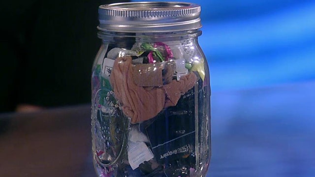 Entrepreneur fits two-years of garbage into Mason jar  