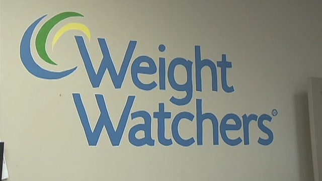 Weight Watchers shares hit record low