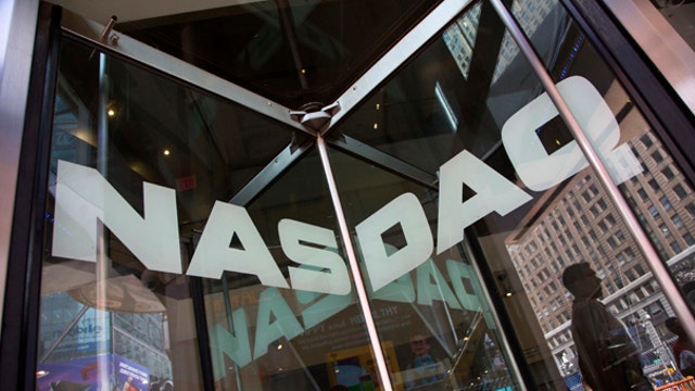 Nasdaq closes above 5K for first time since March 2000