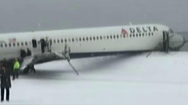 Delta plane skids off LaGuardia Airport runway