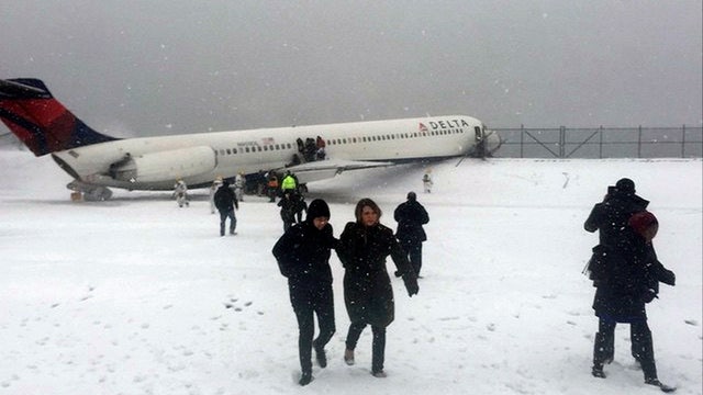 Delta plane skids off runway