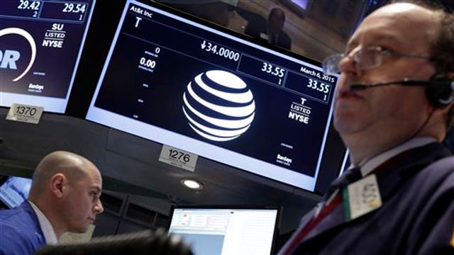 Dow kicks out AT&T and puts Apple in