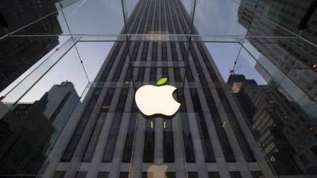 Apple replaces AT&T in the Dow Industrials