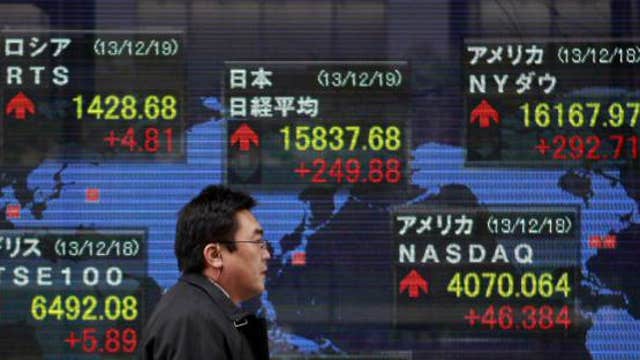 Asian shares mostly higher ahead of Fed meeting