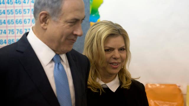 Exit polls show Netanyahu leading tight race in Israel