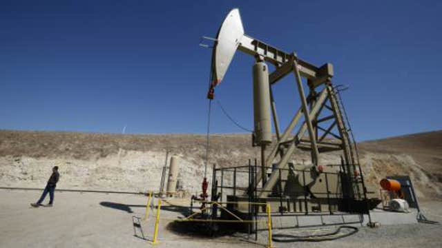 Oil touches six-year low