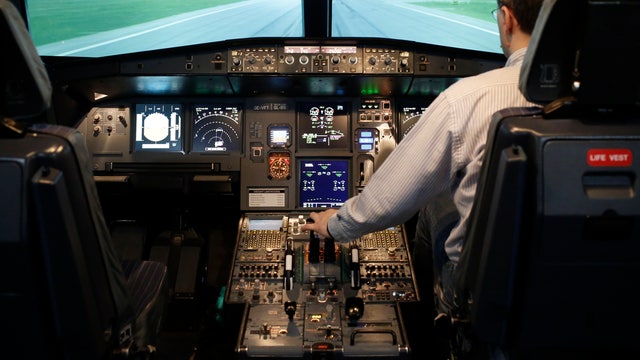 Should there be three pilots in plane cockpits?  