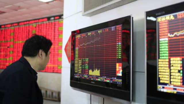 Asian markets mixed, Shanghai gains on China data