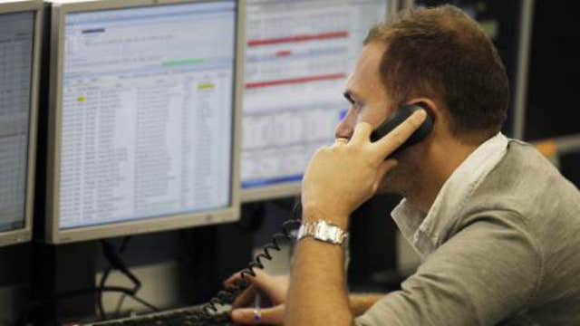 European shares mostly lower as Greece concerns return