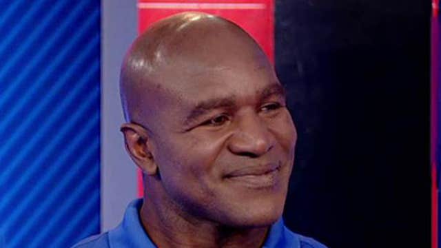Evander Holyfield on boxing Mitt Romney in charity match