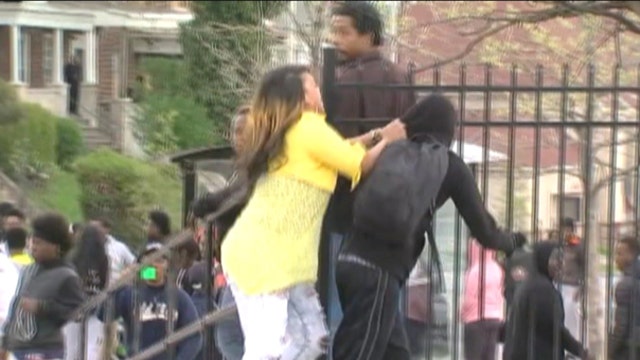 One Baltimore rioter stopped in his tracks, by his mom