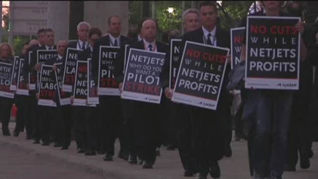 NetJets pilots protest outside Berkshire Hathaway’s annual meeting