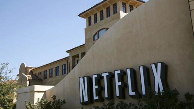 Netflix shares hit new high