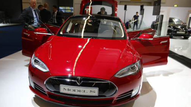 Tesla reports narrower-than-expected 1Q loss