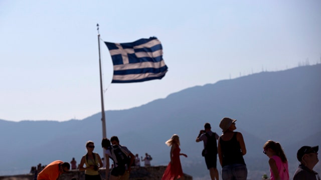 Greek café owner: Business down 70%