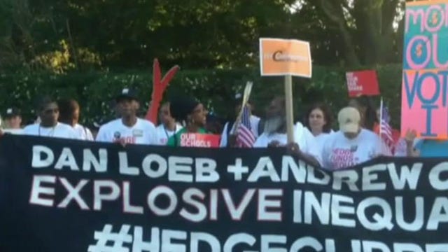 Activist protest outside Dan Loeb’s Hamptons home