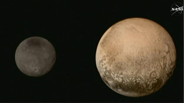 Never before seen close-up photos of Pluto