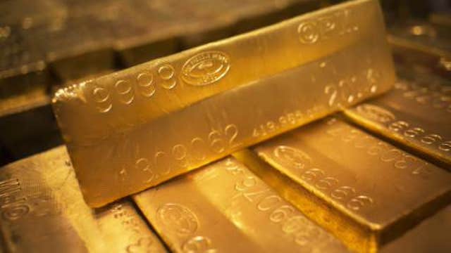 Gold prices hit five-year low