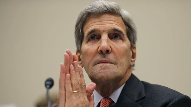 Kerry snaps back over Iran 