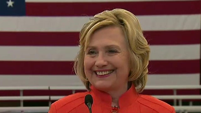 Clinton tries to downplay email scandal with humor