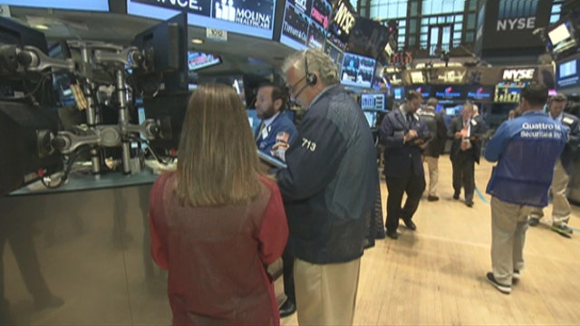 Tension mounts on NYSE floor as opening bell rings