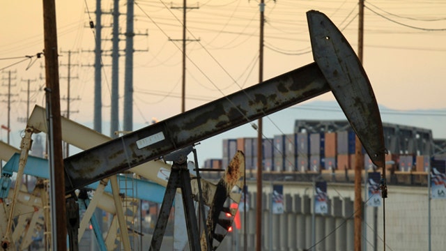 Oil prices weigh on Chevron, Exxon shares