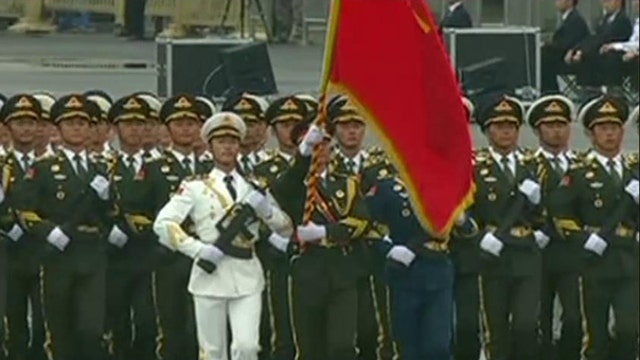 China’s President pledges to cut military by 300K during parade speech