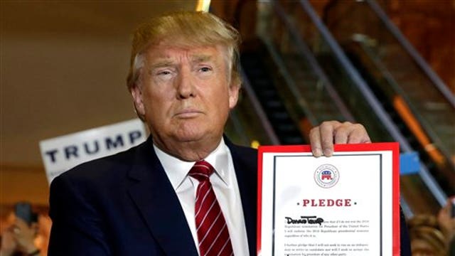 Donald Trump signs GOP pledge