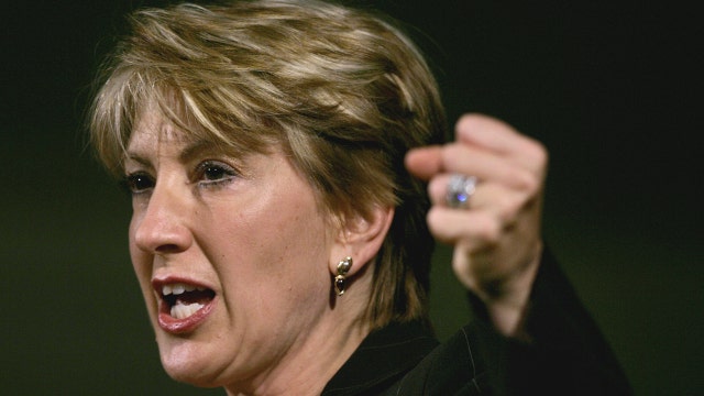 Fiorina defends HP record 