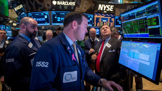 Markets tumble, Dow falls more than 300 points